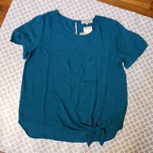 Teal top with side tie. NWT